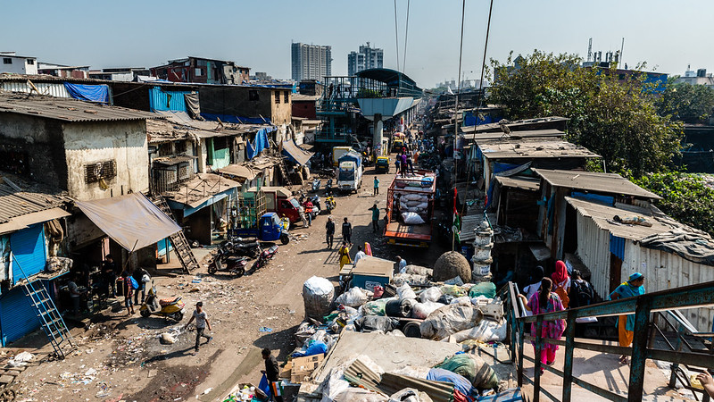 This image depicts the entrance to the Dharavi district from the railroad.
