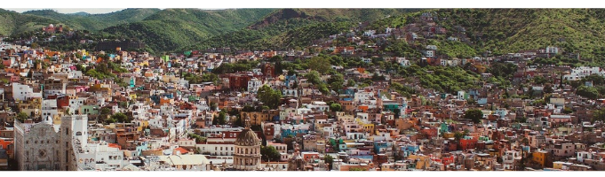 ES - Banner - Series of Debates about the Right to the City in Latin America 2021 Picture of a hilly Latin American city
