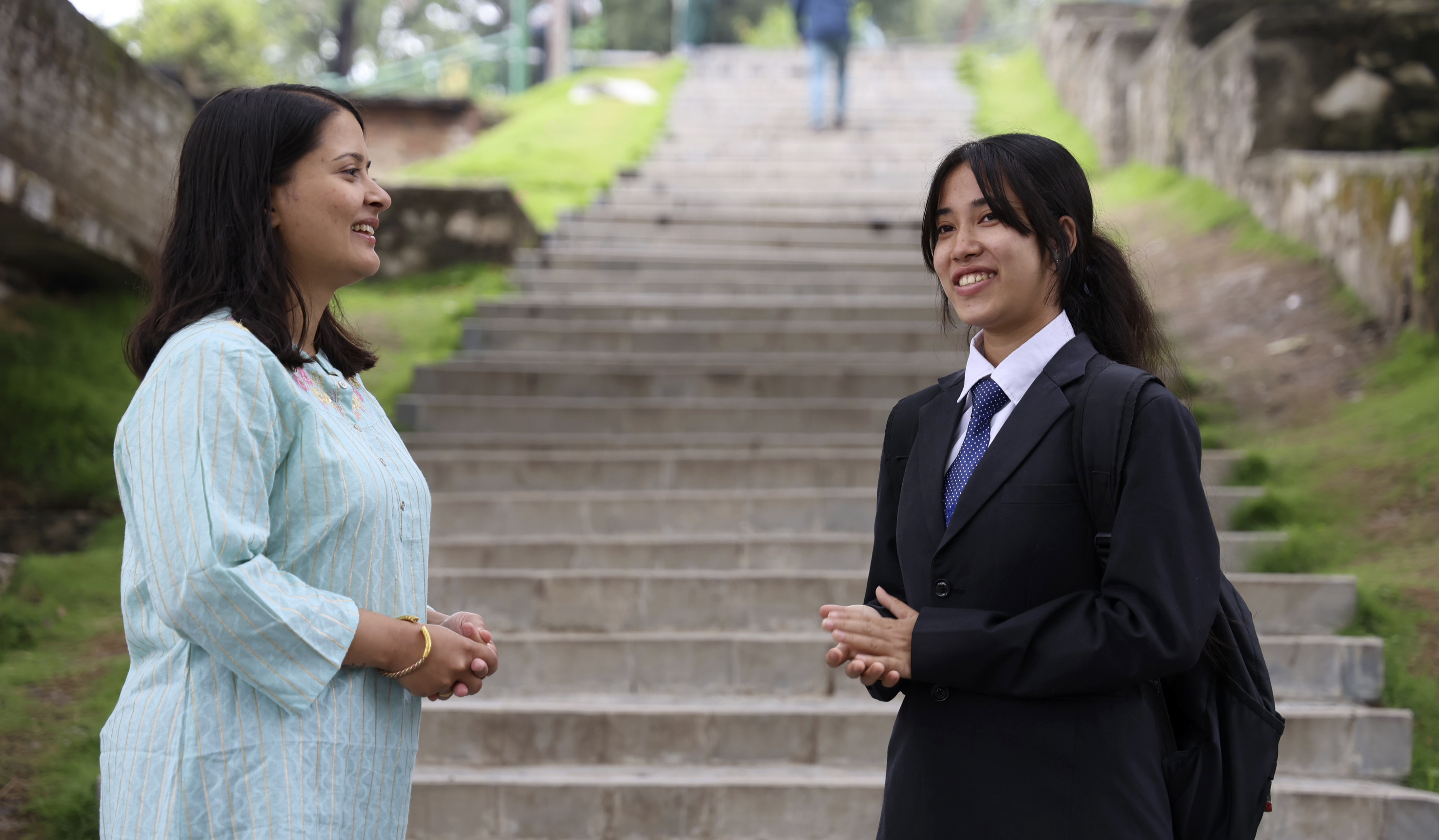 Padma discusses urban design with a schoolgirl in Chandragiri Padma discusses urban design with a schoolgirl in Chandragiri
