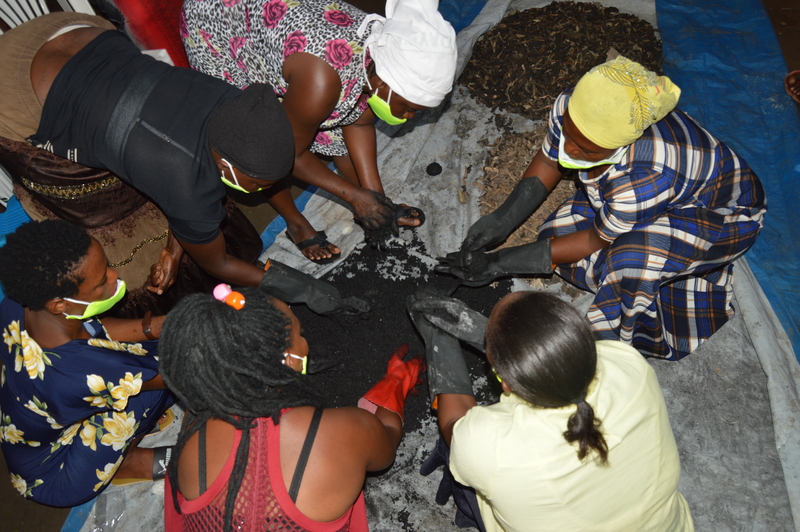 Hands on training for participants on waste sorting, carbonizing and briquette making. Photo Credit; TAU.JPG