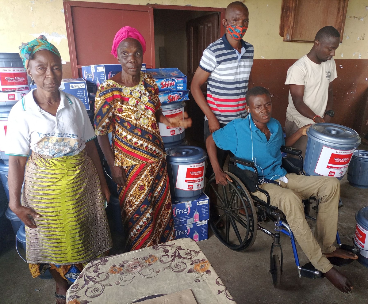 Covid-19 response in Liberia FCDO distribution April 2021 Covid-19 response in Liberia: residents of informal settlements in Monrovia receive hygiene supplies