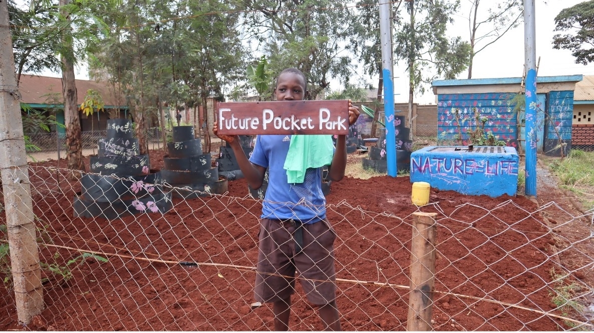 Child in a Carbon Sink Pocket Park created by Hope raisers in Kenya. Photo: Hope Raisers Child in a Carbon Sink Pocket Park created by Hope Raisers in Kenya. Photo: Hope Raisers