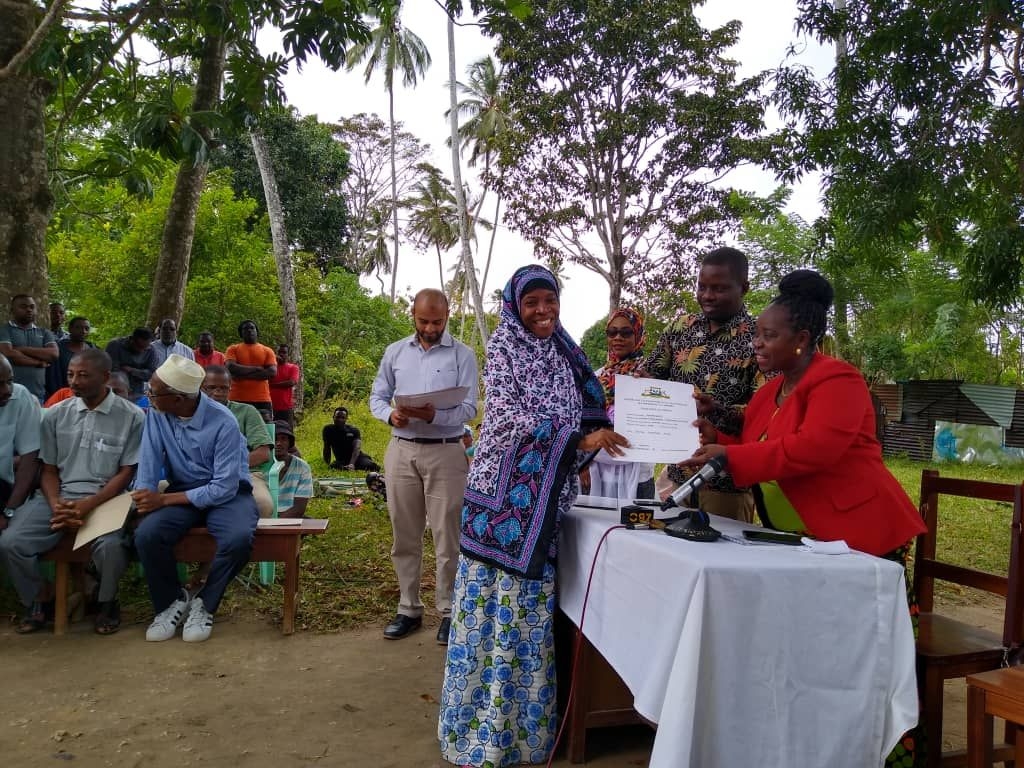Zanzibar, residents receive land titles. Photo_ Spatial Collective Zanzibar, residents receive land titles. Photo_ Spatial Collective