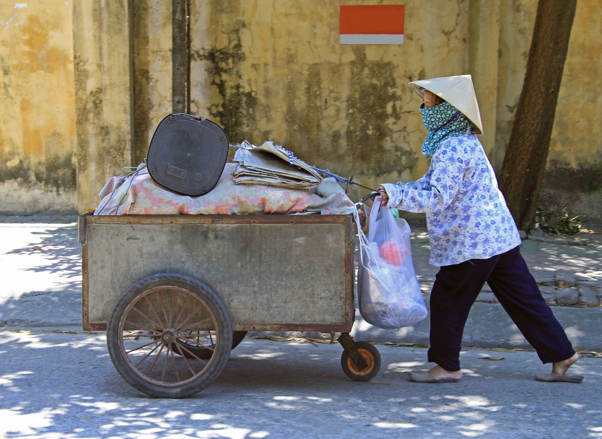 Woman with mask, Vietnam. Credit: Babble-Adobestock.com Woman with mask, Vietnam. Credit: Babble-Adobestock.com