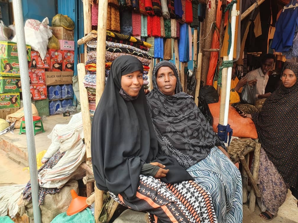 Amira and her mother, Waris Harbi Rage pictured at their market stall in Jigjiga, Ethiopia. Amira and her mother, Waris Harbi Rage pictured at their market stall in Jigjiga, Ethiopia.