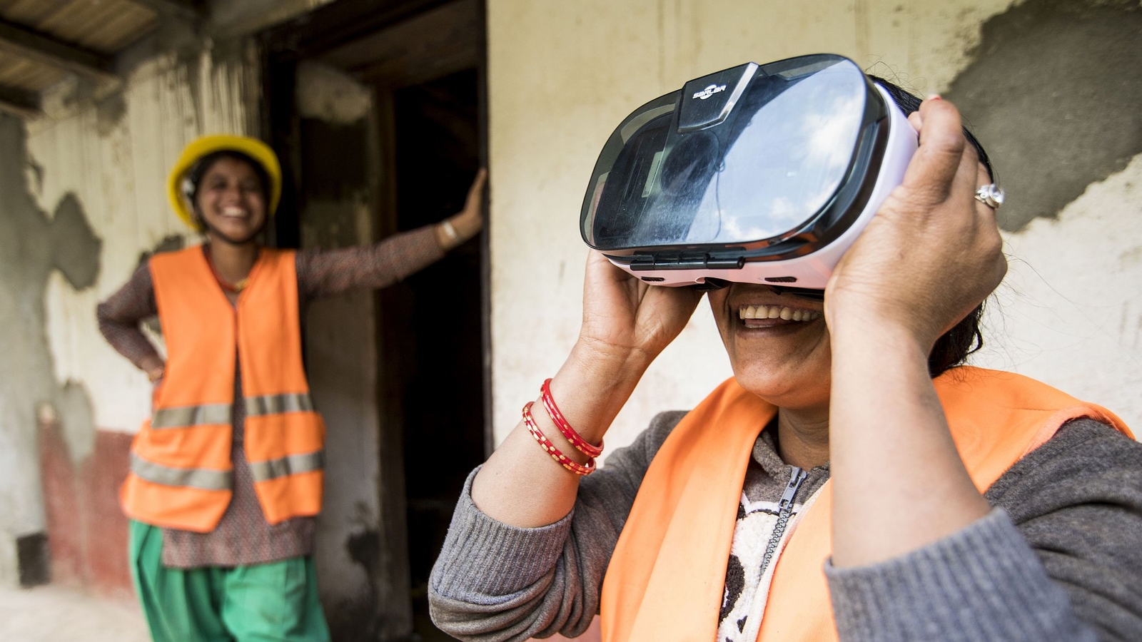 Woman with a VR headset. Nepal. Photo: UNOPS_John Rae