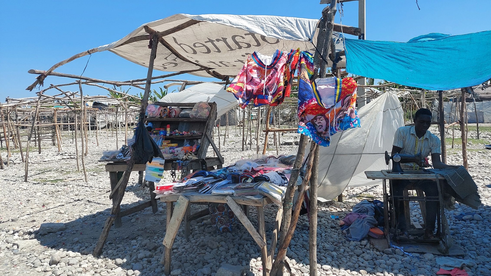 Man at a market in the city of  Les Cayes, Haiti